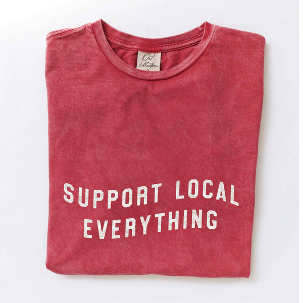 Red t-shirt with 'Support Local Everything' text on a white background